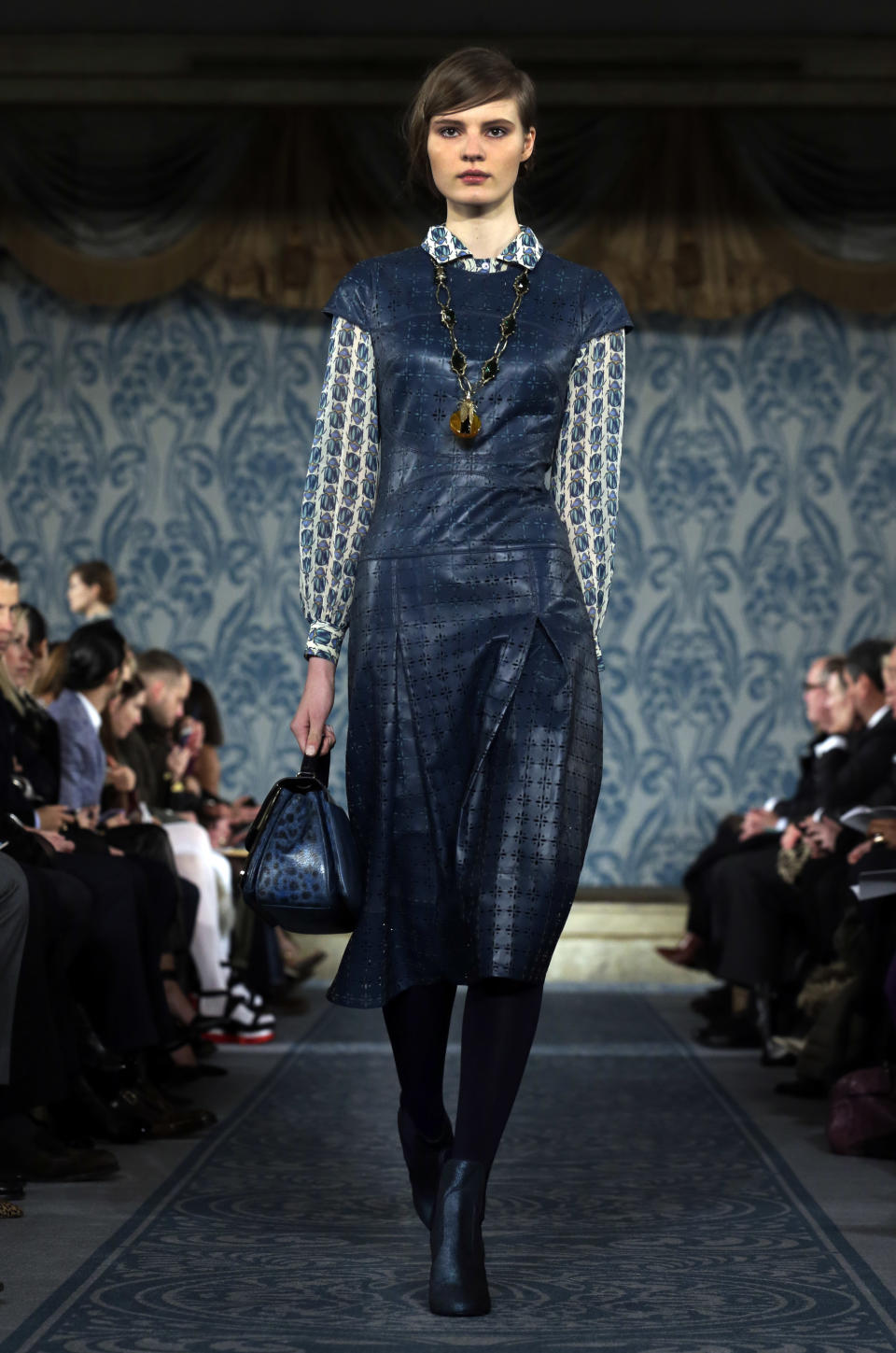 The Tory Burch Fall 2013 collection is modeled during Fashion Week in New York, Tuesday, Feb. 12, 2013. (AP Photo/Richard Drew)