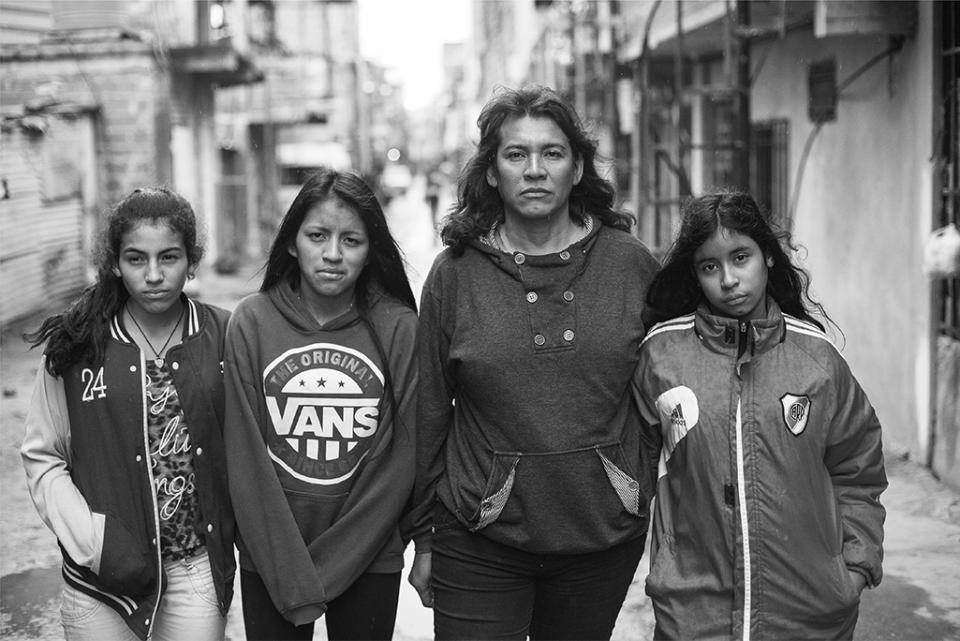 <p>Cinthia and her three daughters, Amira Ayelen, Nahir Daiana, and Zamira Nahomi, in Villa 31, Buenos Aires. (Copyright © 2018 by Kike Arnal. These images originally appeared in Revealing Selves: Transgender Portraits from Argentina, published by The New Press. Reprinted here with permission.) </p>