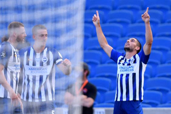 Neal Maupay celebrates scoring against Arsenal (AP)