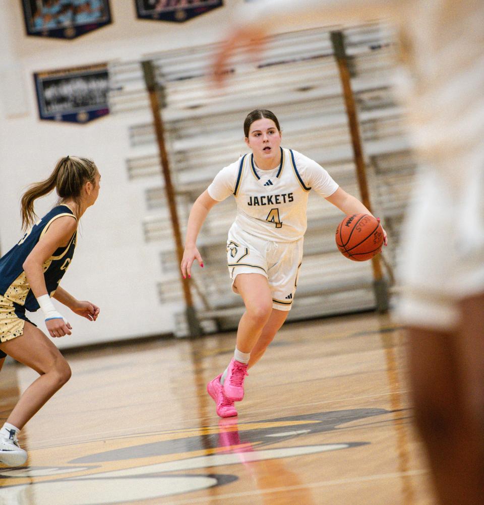 Detroit Country Day's Emma Arico looks to pass during a girls basketball game on Monday, Feb. 5, 2024.