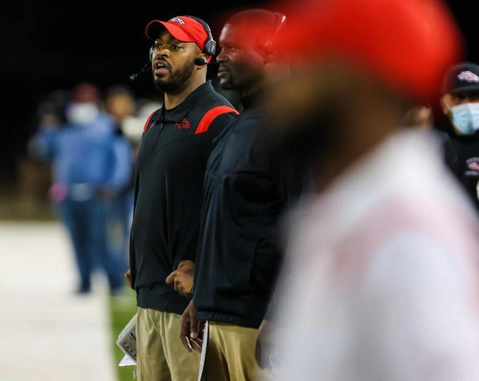 South Pointe Stallions head coach DeVonte’ Holloman directs his team against the Beaufort Eagles in the Class 4A SC State Championship Game at Benedict College in Columbia, SC, Thursday night, December 2, 2021.