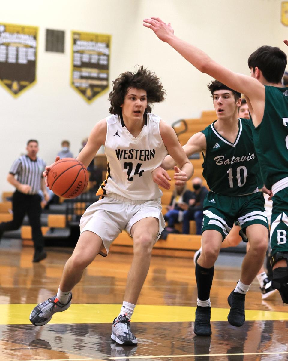 Batavia forward Drew Novak looks for an opening in the game between Batavia and Western Brown high school Jan. 29, 2021