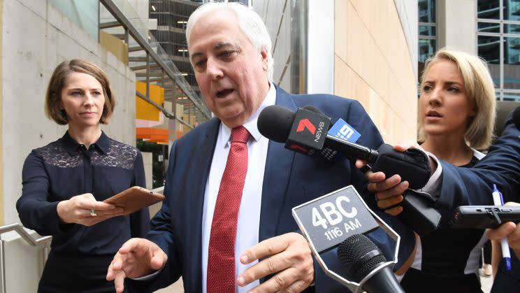 Clive Palmer is questioned by reporters as he leaves the Federal Court in Brisbane, Wednesday, Feb. 15, 2017. Liquidators are resuming their examination of former federal MP Clive Palmer, over the collapse of Queensland Nickel. (AAP Image/Dave Hunt)