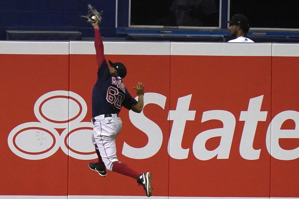 Boston Red Sox left fielder Yairo Munoz catches a ball hit by Miami Marlins' Jazz Chisholm during the eighth inning of a baseball game, Tuesday, Sept. 15, 2020, in Miami. (AP Photo/Lynne Sladky)