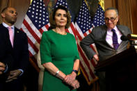 U.S. Senate Minority Leader Chuck Schumer (D-NY) (R) attends a news conference on President Trump's first 100 days on Capitol Hill, next to House Minority Leader Nancy Pelosi (D-CA) in Washington, U.S April 28, 2017. REUTERS/Yuri Gripas