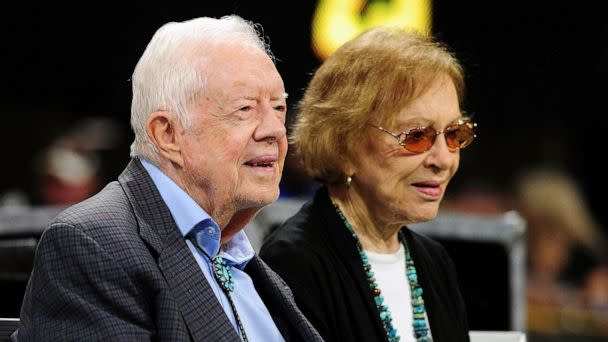 PHOTO: FILE - Former president Jimmy Carter and his wife Rosalynn prior to a game at Mercedes-Benz Stadium, Sept. 30, 2018 in Atlanta. (Scott Cunningham/Getty Images, FILE)