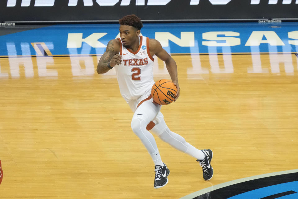 KANSAS CITY, MISSOURI - MARCH 26:  Arterio Morris #2 of the Texas Longhorns dribbles the ball during the Elite Eight round of the NCAA Men's Basketball Tournament against the Miami (Fl) Hurricanes at T-Mobile Center on March 26, 2023 in Kansas City, Missouri.  (Photo by Mitchell Layton/Getty Images)