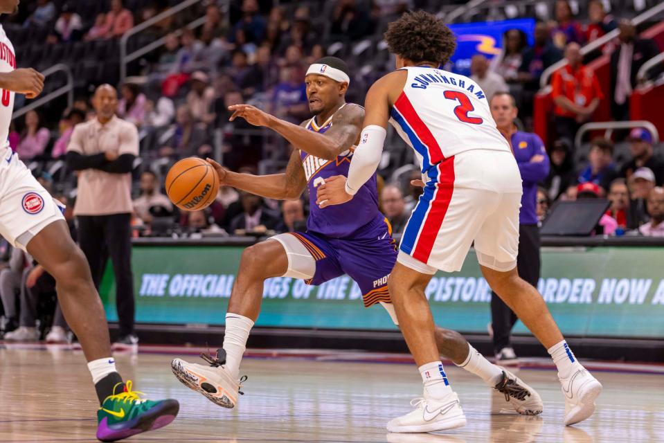 Detroit Pistons guard Cade Cunningham defends Phoenix Suns guard Bradley Beal during the first half of a preseason game at Little Caesars Arena, Oct. 8, 2023.