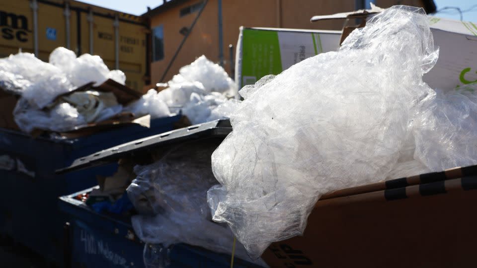 Discarded plastic and other debris overflow from a Los Angeles trash bin. Surfrider Foundation reports less than 7% of plastic gets recycled in the US.  - Mario Tama/Getty Images