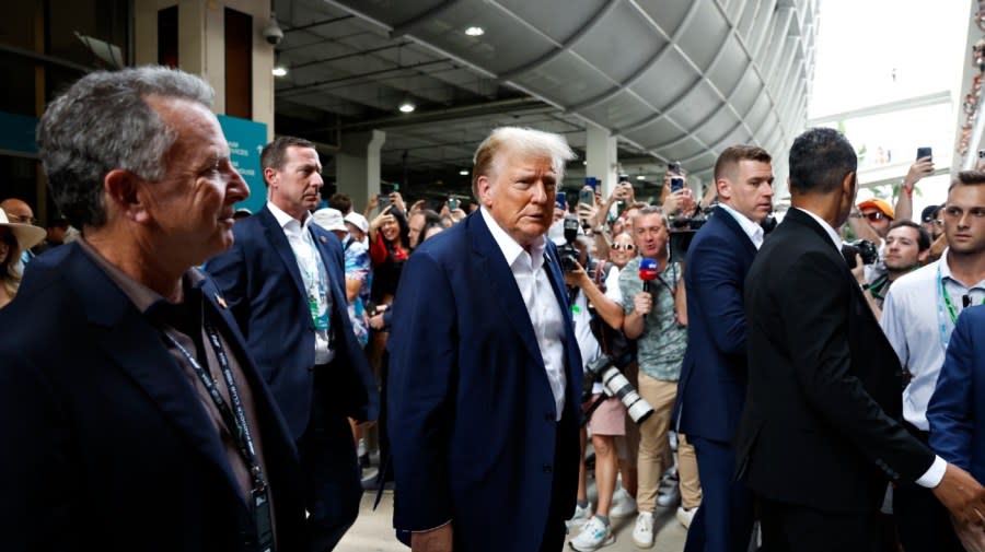 MIAMI, FLORIDA - MAY 05: Donald Trump walks in the Paddock prior to the F1 Grand Prix of Miami at Miami International Autodrome on May 05, 2024 in Miami, Florida. (Photo by Chris Graythen/Getty Images)