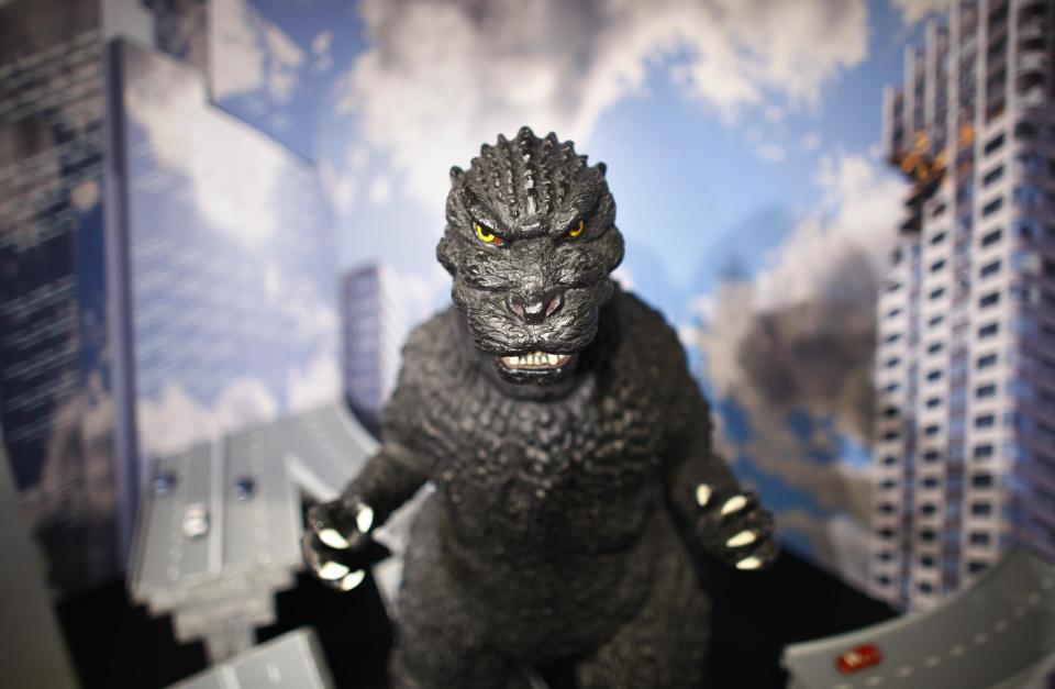 In this Monday, April 28, 2014 photo, a large size figure of Godzilla in a diorama is on display at Cheepa's gallery in Tokyo. Godzilla-lovers in this nation where the stomping all began say their iconic hero falls into a special phantasmal category called “kaiju,” different from more mundane monsters like King Kong or Frankenstein. (AP Photo/Junji Kurokawa)