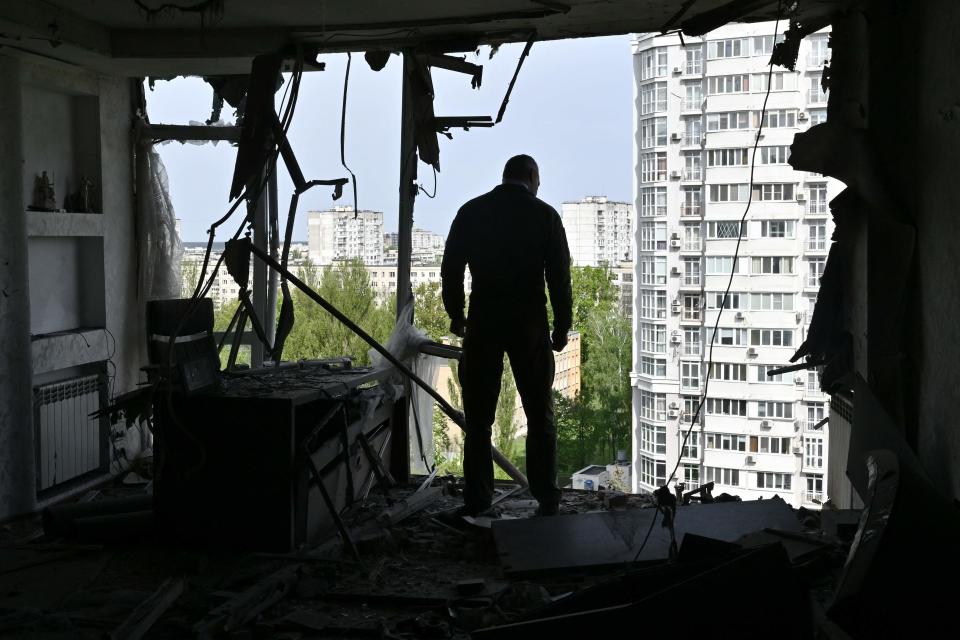 Mayor of the Ukrainian capital Kyiv, Vitali Klitschko, examines high-rise residential building damaged by remains of a shot down Russian drone in Kyiv on May 8, 2023, amid the Russian invasion of Ukraine.