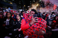 TORONTO, ON - JUNE 13: Toronto Raptors fans cheer after the team beat the Golden State Warriors in Game Six of the NBA Finals, during a viewing party in Jurassic Park outside of Scotiabank Arena on June 13, 2019 in Toronto, Canada. (Photo by Cole Burston/Getty Images)