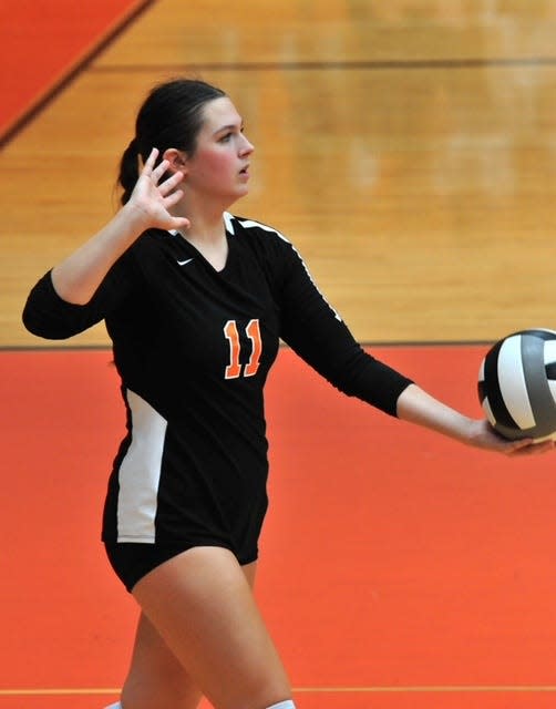 Ashland High School's Jenna Hartson serves the ball during a match in 2022. The Ashland High School senior was awarded the 2024 Roosevelt Robinson Memorial Sports Scholarship. (LIZ A. HOSFELD/ASHLAND TIMES-GAZETTE FILE PHOTO)