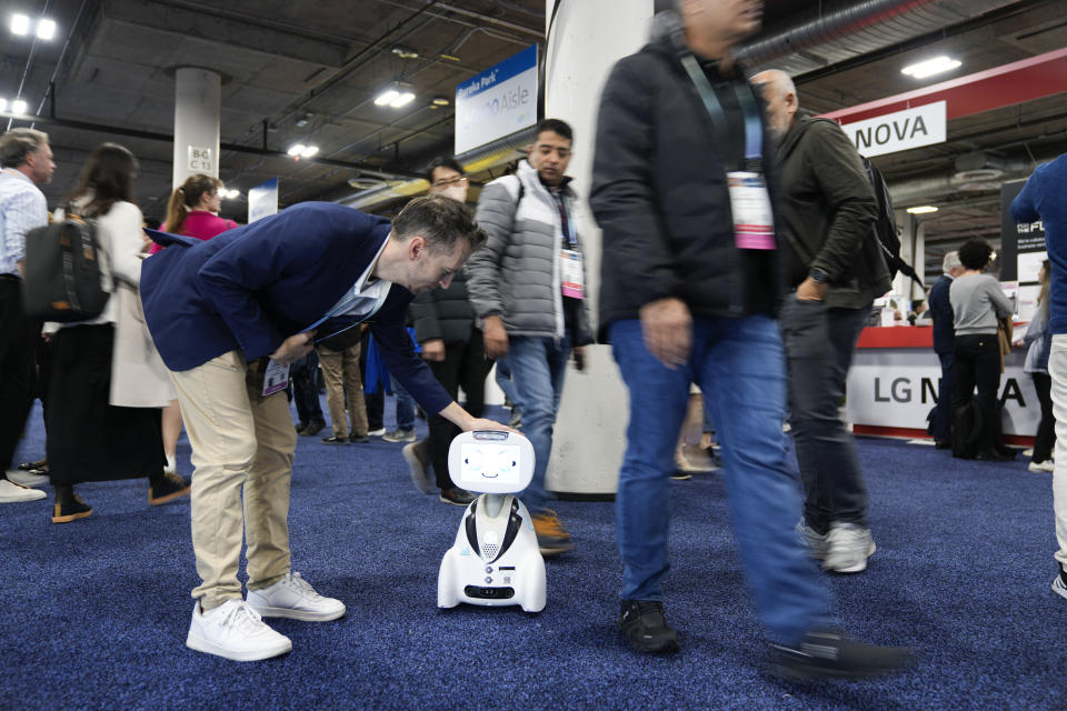 Buddy, the Emotional Robot, by Blue Frog Robotics, is seen on the show floor during the CES tech show Wednesday, Jan. 10, 2024, in Las Vegas. (AP Photo/Ryan Sun)