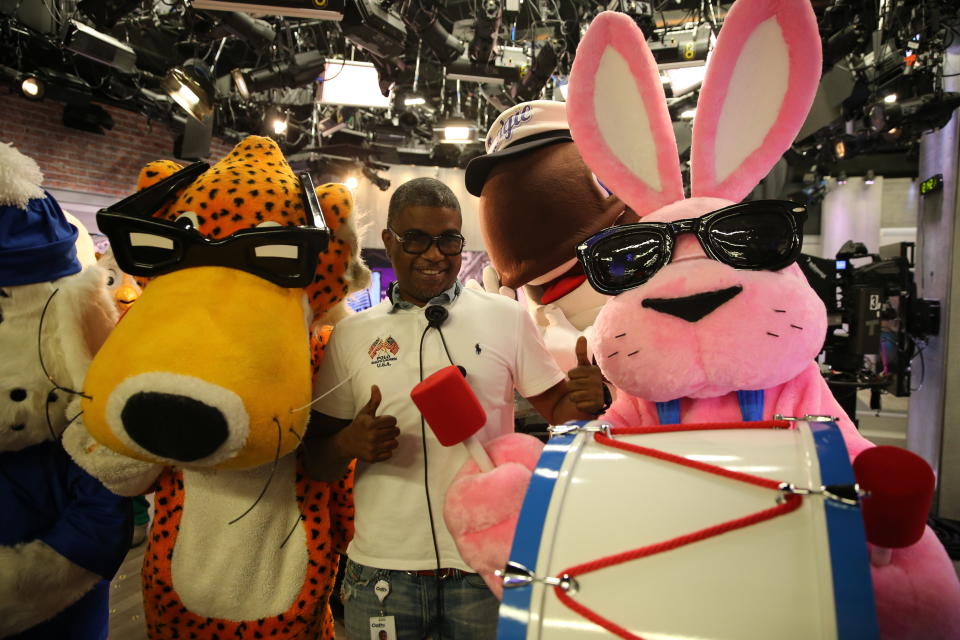 <p>Fudgie the Whale photobombs a staff member posing with Chester the Cheetah and Energizer Bunny at Yahoo Studios in New York City on Sept. 25, 2017. (Photo: Gordon Donovan/Yahoo News) </p>