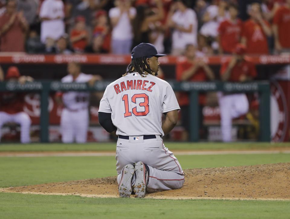 Hanley Ramirez reacts after throwing away the game. (AP)