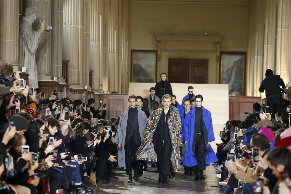 Models wear creations for Issey Miyake Men's Fall Winter 2017-2018 fashion collection, presented in Paris, Thursday, Jan. 19, 2017. (AP Photo/Francois Mori)