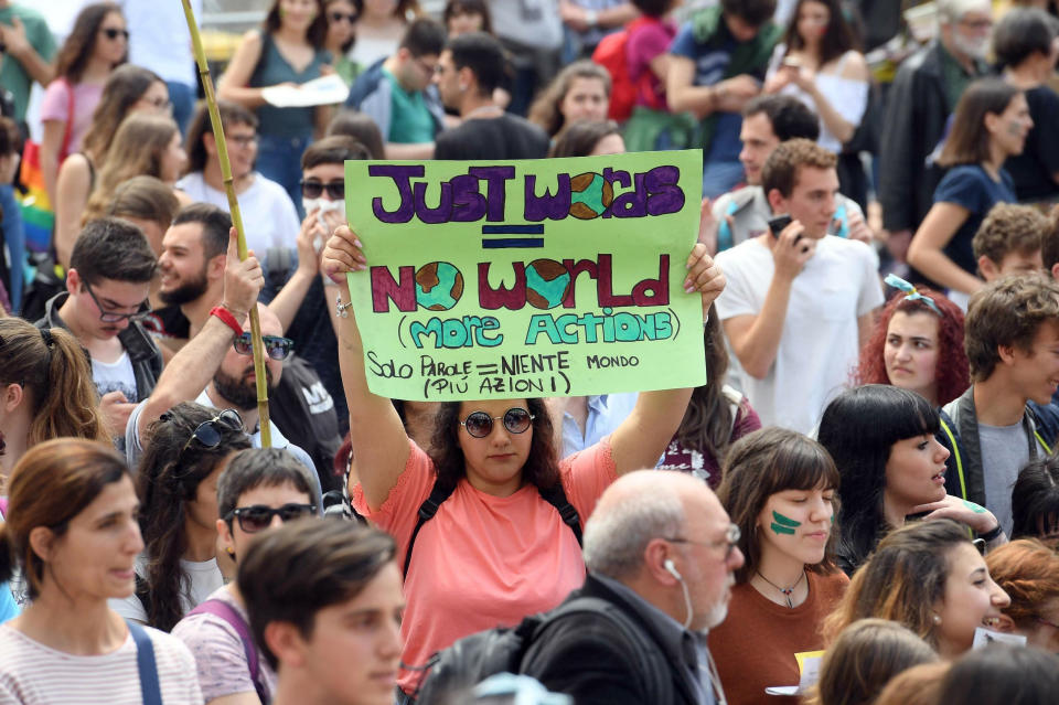 Young demonstrators take part in a demonstration organised by 'Global Strike 4 Climate' beneath the Monument of the Unknown Soldier, in Rome, Friday, May 24, 2019. (Maurizio Brambatti/ANSA via AP)