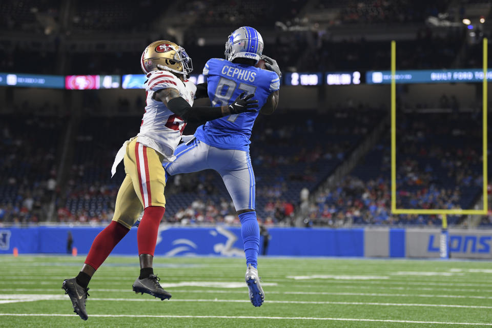 Detroit Lions wide receiver Quintez Cephus (87) catches a touchdown pass as San Francisco 49ers defensive back Dontae Johnson defends in the second half of an NFL football game in Detroit, Sunday, Sept. 12, 2021. (AP Photo/Lon Horwedel)