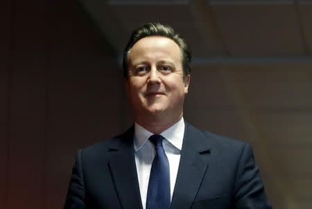 Britain's Prime Minister David Cameron arrives to address a news conference after a European Union leaders summit in Brussels, Belgium, February 19, 2016. REUTERS/Francois Lenoir