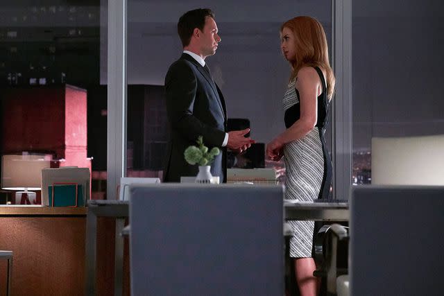 <p>Shane Mahood/USA Network/NBCU Photo Bank/NBCUniversal via Getty</p> Patrick J. Adams and Sarah Rafferty in season 7 of 'Suits.'