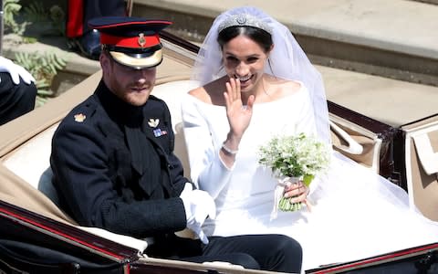 Prince Harry and Meghan Markle leave St George's Chapel  - Credit: Andrew Matthews /PA