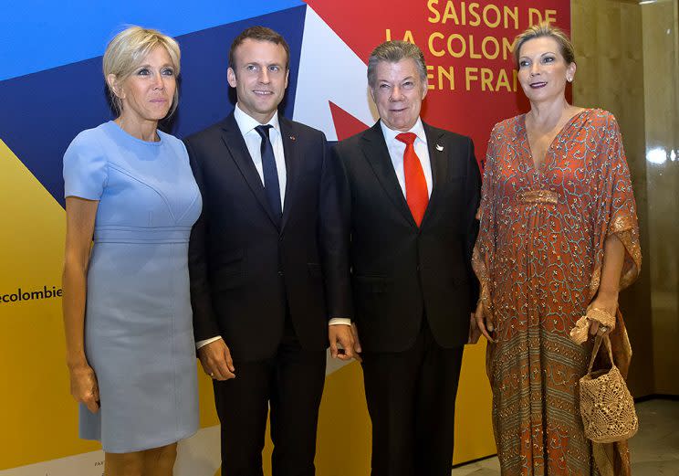 French first lady Brigitte Macron and President Emmanuel Macron; Colombian President Juan Manuel Santos and his wife, María Clemencia Rodríguez. (Photo: AP Photo/Michel Euler)