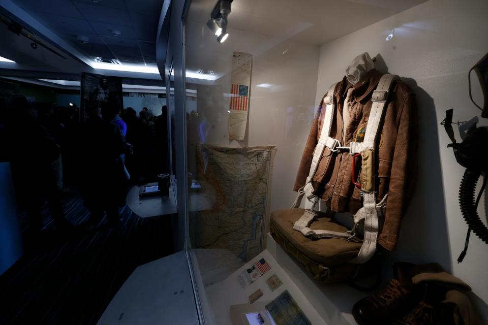 A Tuskegee pilot’s jacket, one of many items on display inside of the Tuskegee Airmen National Museum at the Charles H. Wright Museum of African American History in Detroit on Friday, March 10, 2023. The Detroit Chapter of Tuskegee Airmen announced it had received a $500,000 FAA grant to train local students as pilots.