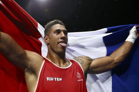 2016 Rio Olympics - Boxing - Final - Men's Super Heavy (+91kg) Final Bout 273 - Riocentro - Pavilion 6 - Rio de Janeiro, Brazil - 21/08/2016. Tony Yoka (FRA) of France celebrates after winning his bout. REUTERS/Peter Cziborra