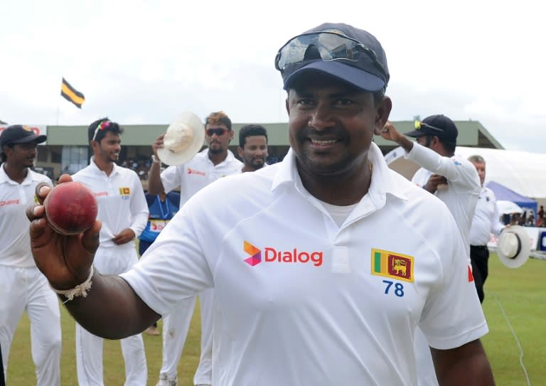 Rangana Herath leaves the field after taking six second innings wickets against Bangladesh