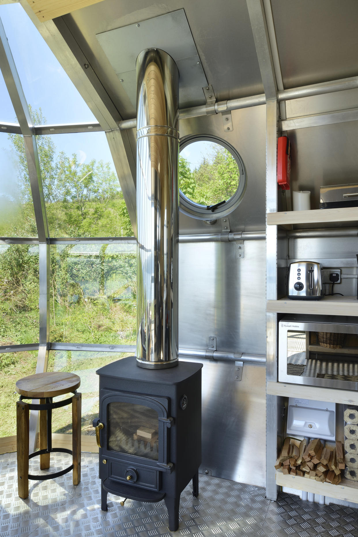 A log burner keeps guests cosy. (Nigel Rigden/SWNS)