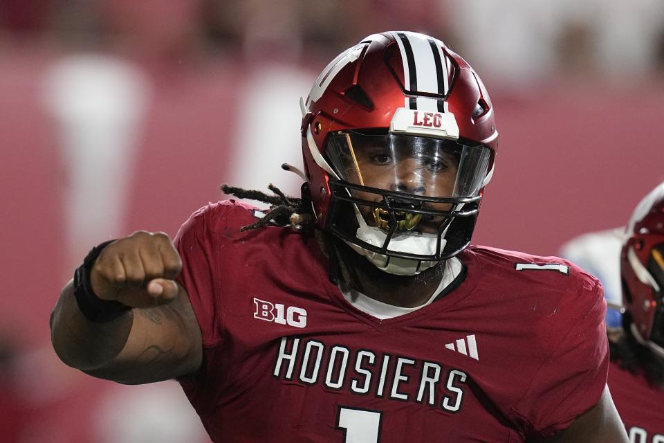 Indiana defensive lineman Andre Carter reacts after sacking Indiana State quarterback Evan Olaes during the second half of an NCAA college football game, Friday, Sept. 8, 2023, in Bloomington, Ind. (AP Photo/Darron Cummings)