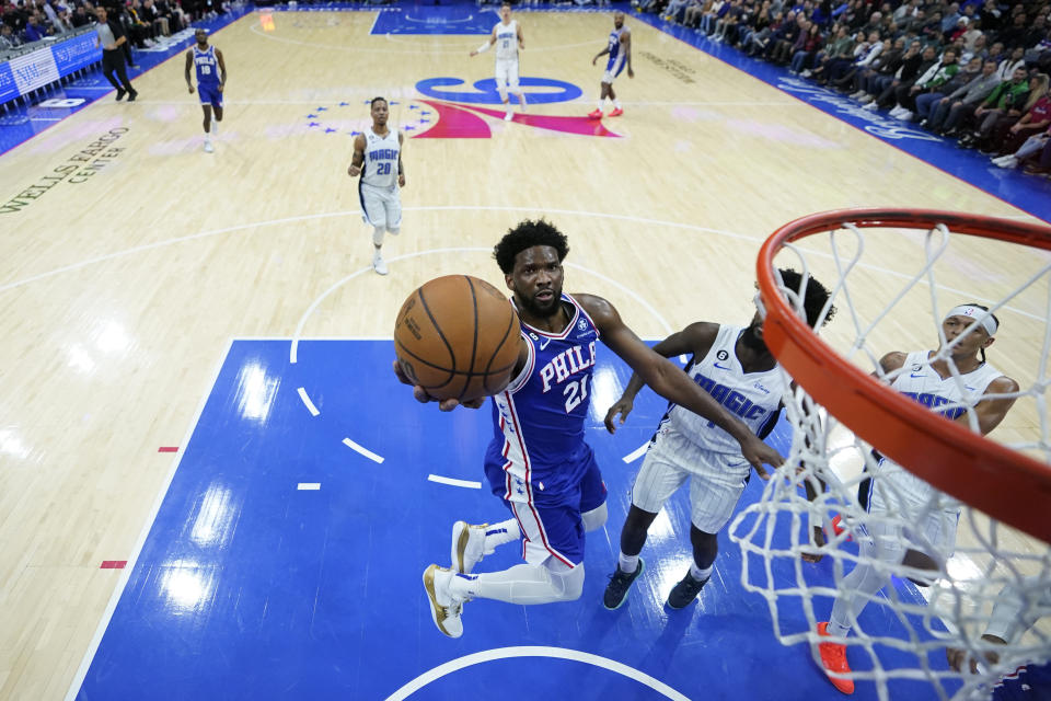 Philadelphia 76ers' Joel Embiid goes up for a shot during the first half of an NBA basketball game against the Orlando Magic, Monday, Jan. 30, 2023, in Philadelphia. (AP Photo/Matt Slocum)