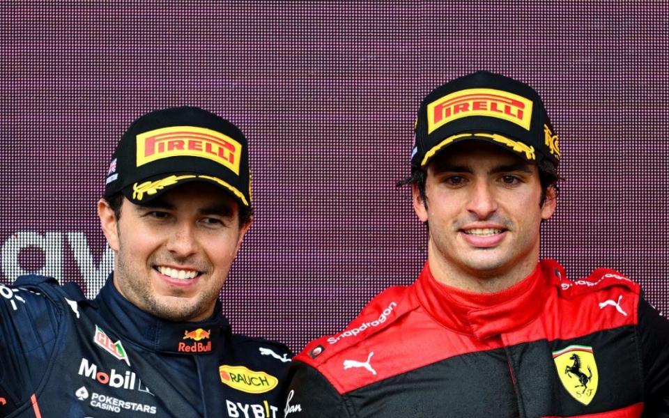 Race winner Carlos Sainz of Spain and Ferrari, Second placed Sergio Perez of Mexico and Oracle Red Bull Racing and Third placed Lewis Hamilton of Great Britain and Mercedes celebrate on the podium during the F1 Grand Prix of Great Britain at Silverstone on July 03, 2022 in Northampton, England - Getty Images Europe 