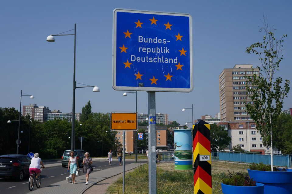 FRANKFURT (ODER), GERMANY - JUNE 13: A sign marks the German border at the Oder River at the border to Poland hours after Polish authorities reopened the border during the novel coronavirus pandemic on June 13, 2020 in Frankfurt (Oder), Germany. Poland lifted restrictions on its border crossings to Germany, Austria and Slovakia starting at midnight, last night that had been in place since March to stem the spread of the virus.  (Photo by Sean Gallup/Getty Images)