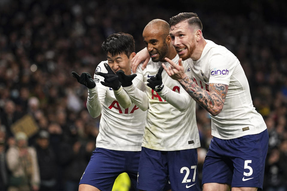 Tottenham Hotspur's Son Heung-min, left, celebrates scoring his side's third goal during the English Premier League soccer match between Tottenham Hotspur and Norwich City, at Tottenham Hotspur Stadium, London, Sunday, Dec. 5, 2021. (Adam Davy/PA via AP)