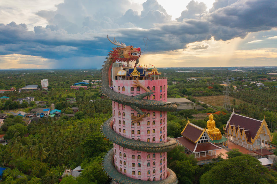 Aerial view of Wat Samphran or Chinese Dragon Temple in Sam Phran District in Nakhon Pathom province near Bangkok Urban City, Thailand. Tourist attraction landmark in travel trip concept.