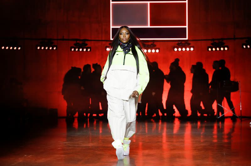 Model Naomi Campbell presents a creation during the Tommy Hilfiger 'TOMMYNOW Spring 2020' show during London Fashion Week in London