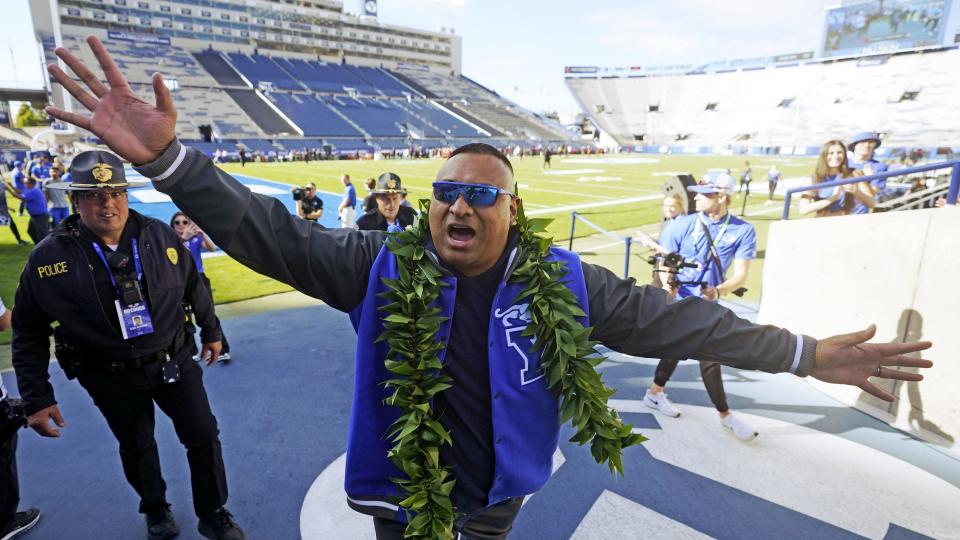BYU coach Kalani Sitake greets fans before the start of their game against Texas Tech Saturday, Oct. 21, 2023, in Provo, Utah. | Rick Bowmer, Associated Press