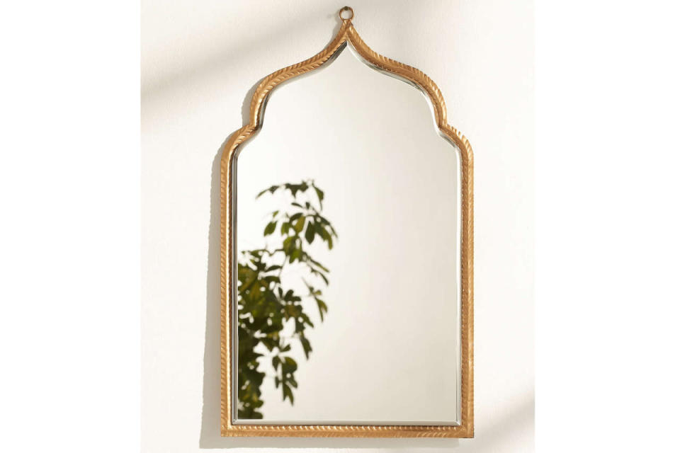 No boho-style room is complete without a beautiful Taj Mahal-inspired mirror.