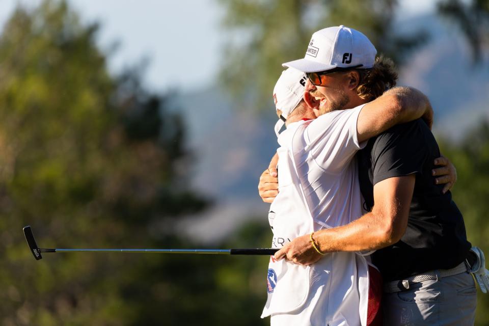 Roger Sloan hugs his caddie after winning the Utah Championship, part of the PGA Korn Ferry Tour, at Oakridge Country Club in Farmington on Sunday, Aug. 6, 2023. Sloan won with a final score of -24. | MEGAN NIELSEN, Megan Nielsen, Deseret News