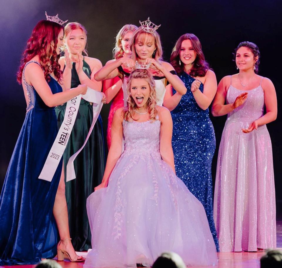 Kalie Klaubauf reacts as she is crowned Miss Door County Outstanding Teen by last year's Outstanding Teen, Claire Bohn, during the Miss Door County 2023 pageant held Feb. 4 at Southern Door Community Auditorium.