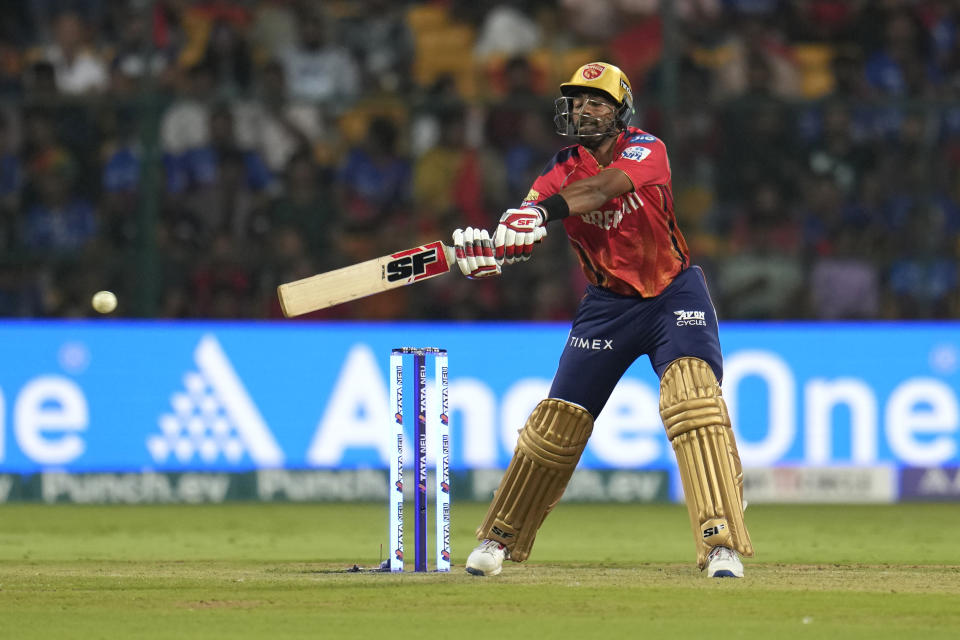 Punjab Kings' Shashank Singh attempts to play a shot during the Indian Premier League cricket match between Royal Challengers Bengaluru and Punjab Kings in Bengaluru, India, Monday, March 25, 2024. (AP Photo/Aijaz Rahi)