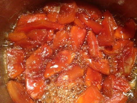 Papaya cooking in panela syrup