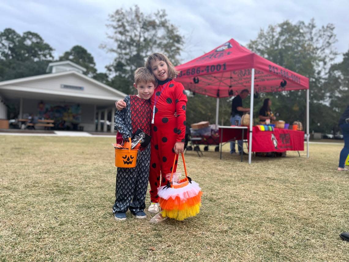 Olivia Cawthon, 8, and her 5-year-old brother, Jack, were excited to get candy Friday at Oscar Frazier Park in Bluffton.