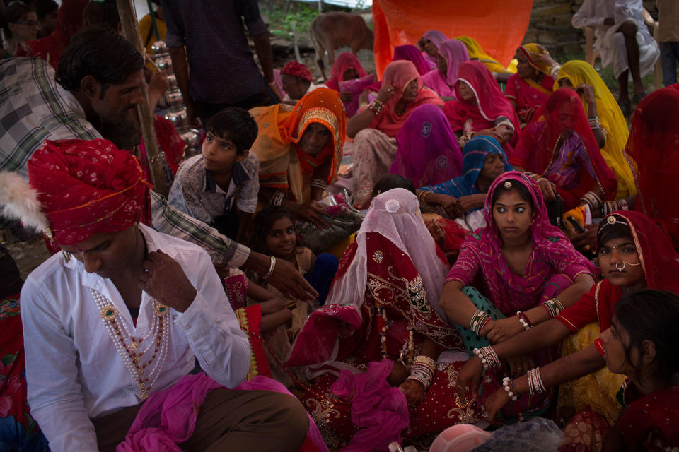 A wedding in a small village near Udaipur, Rajasthan, India in July 2016. The groom says to be 18 years old and the bride 22. A relative says later that she is younger than he. Some families lie about the age of the girls because they are afraid of the government’s actions. Some of these girls don’t have a birth certificate, so it is easier for the families to get away with it. (Photo: Rafael Fabrés)