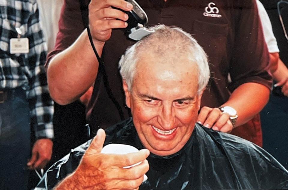 Garrey Carruthers has his head shaved — the result of a challenge to his staff during his time as president and CEO of the Cimarron Health Care Plan.