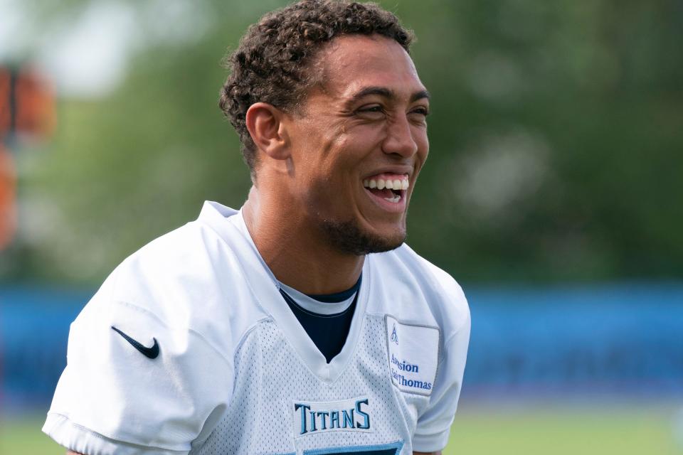 Tennessee Titans wide receiver Nick Westbrook-Ikhine (15) shares a laugh with teammates during a training camp practice at Ascension Saint Thomas Sports Park Saturday, July 30, 2022, in Nashville, Tenn. 