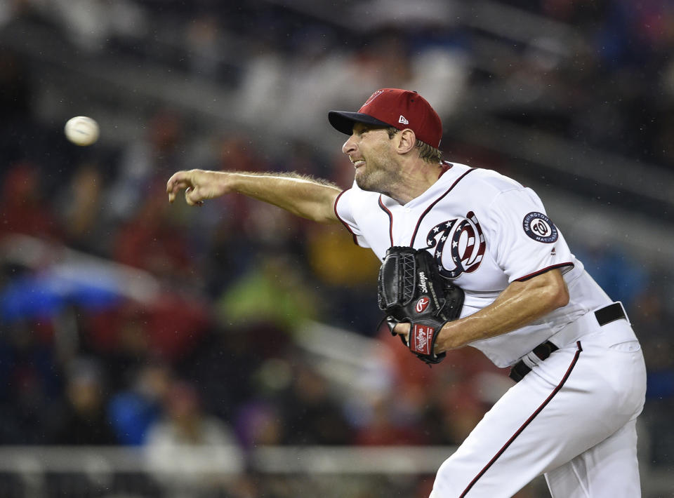 Washington Nationals starting pitcher Max Scherzer delivers during the eighth inning of the first baseball game of a doubleheader against the Chicago Cubs, Saturday, Sept. 8, 2018, in Washington. The Nationals won 10-3. (AP Photo/Nick Wass)
